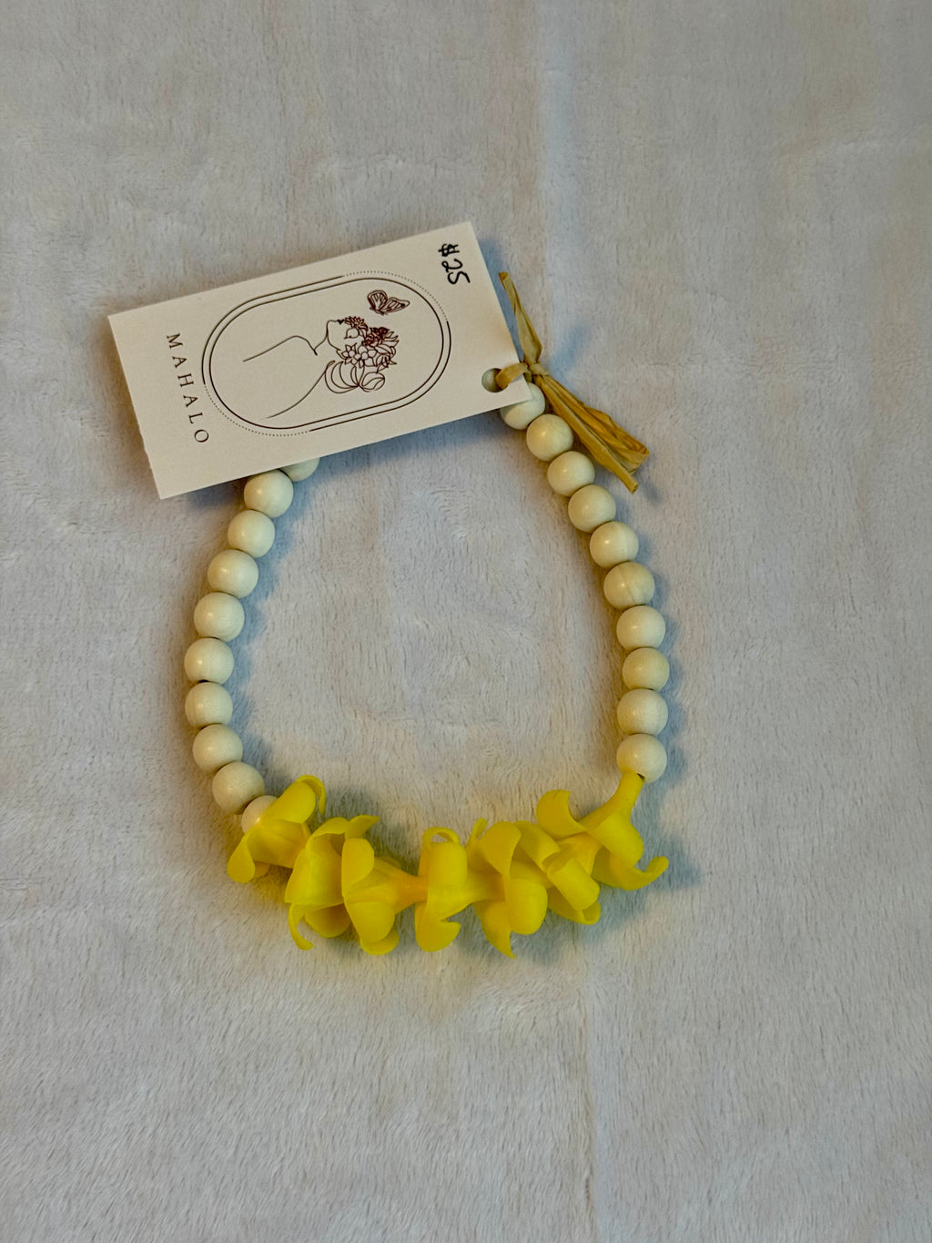 yellow puakenikeni mirror lei